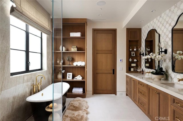 bathroom featuring a bathtub and vanity