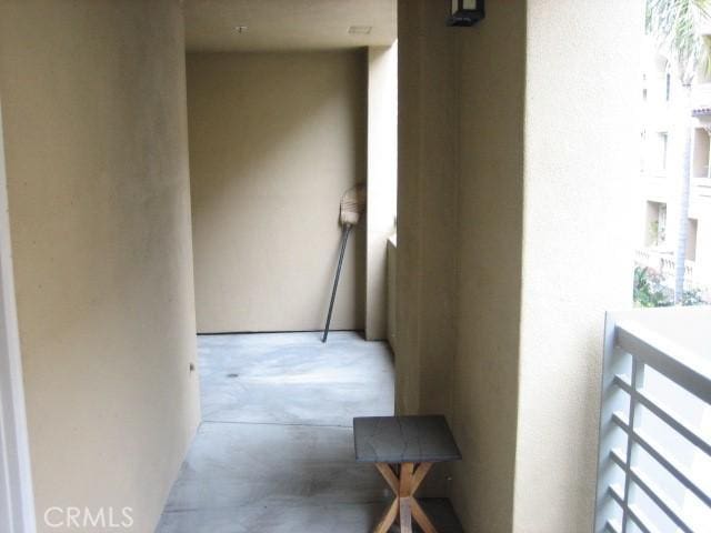 hallway featuring concrete floors