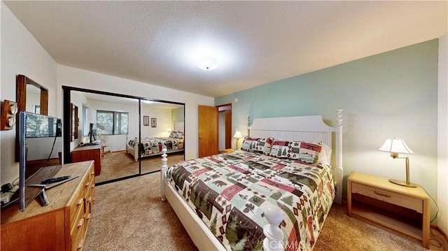 carpeted bedroom with a closet