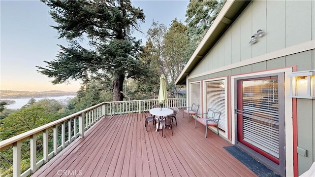 deck at dusk with a water view