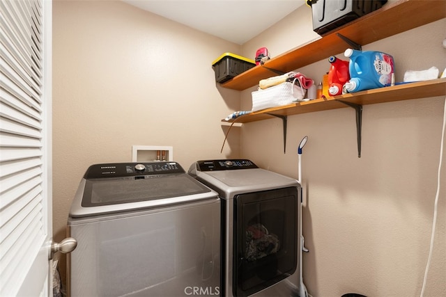 laundry area with washer and dryer