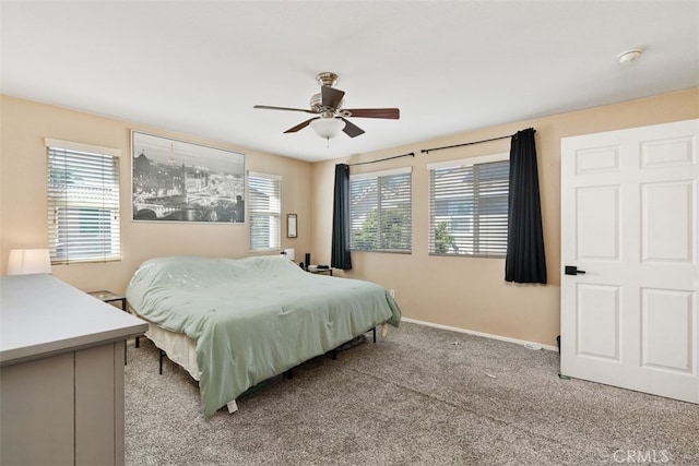 bedroom with light carpet and ceiling fan