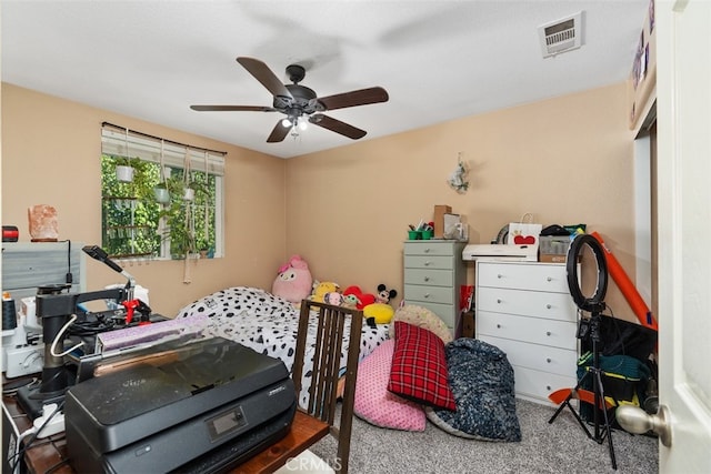 carpeted bedroom with ceiling fan