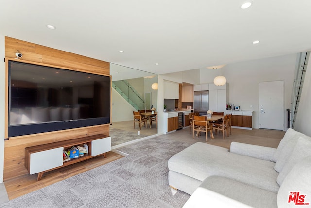 living room with light hardwood / wood-style flooring