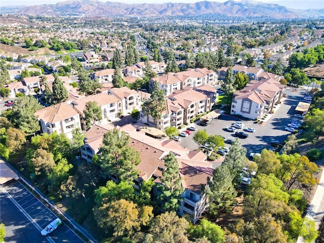 drone / aerial view featuring a mountain view