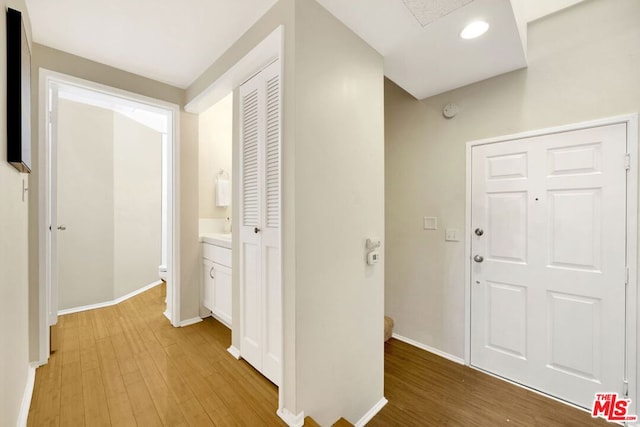 hall featuring light hardwood / wood-style flooring