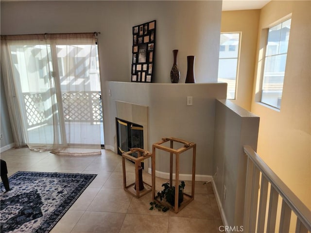 sitting room featuring light tile patterned floors