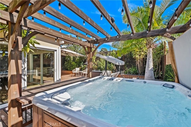 view of pool with a pergola, a hot tub, and a deck