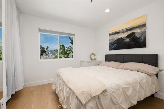 bedroom featuring light wood-type flooring