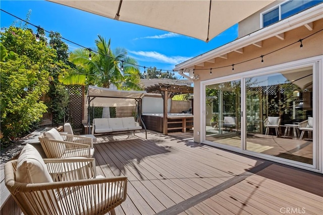 deck featuring an outdoor living space and a pergola