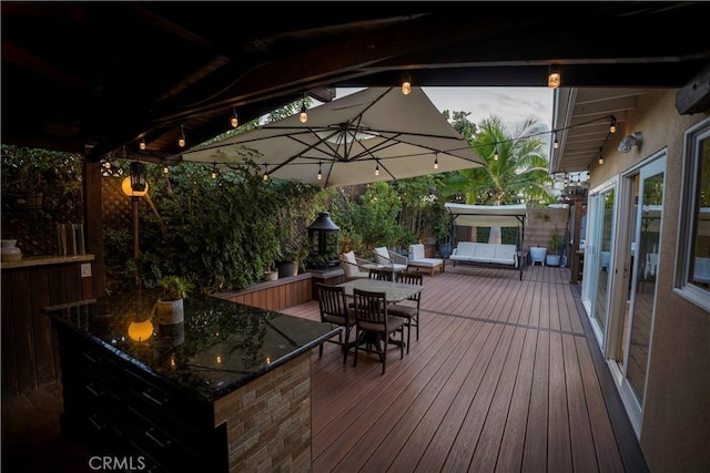 deck featuring an outdoor living space