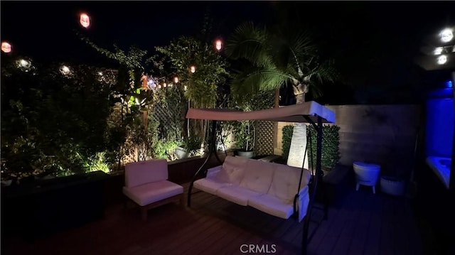 patio at night with outdoor lounge area