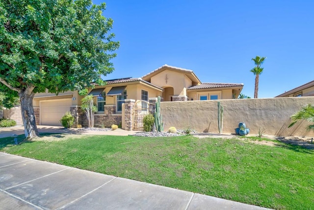 view of front of house featuring a front lawn and a garage