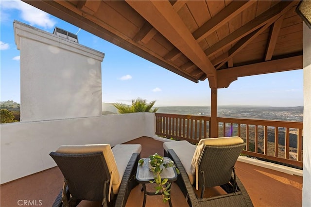 exterior space featuring a water view and a beach view