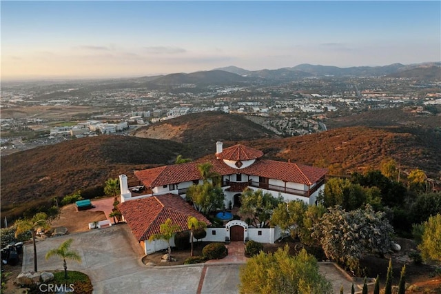 aerial view at dusk with a mountain view