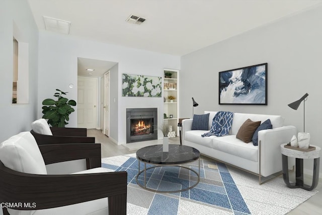 living room with light hardwood / wood-style floors