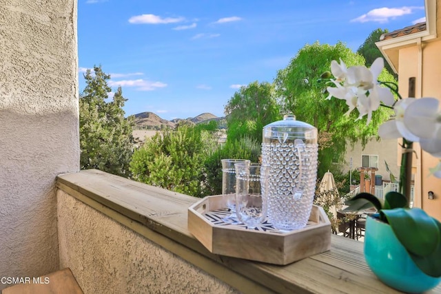 balcony featuring a mountain view