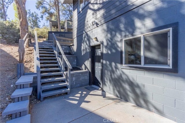 view of side of home featuring a patio