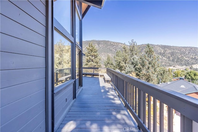 balcony featuring a mountain view