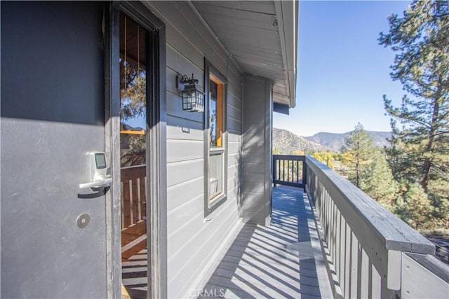 balcony featuring a mountain view