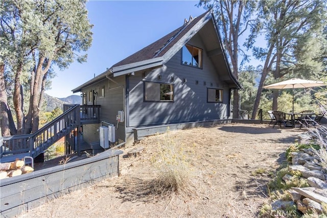 rear view of house with a mountain view