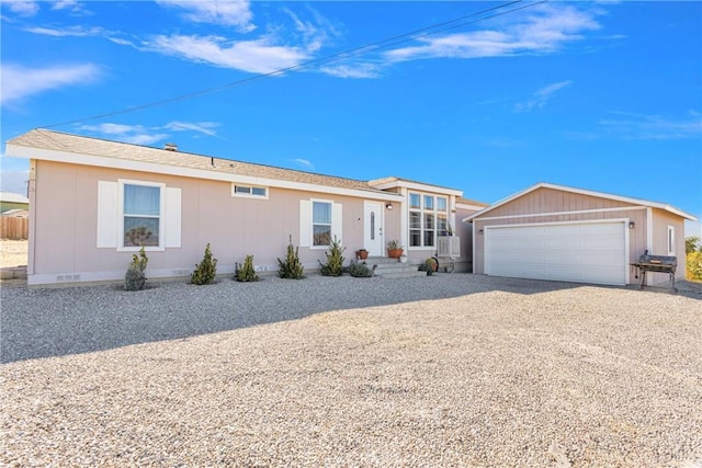 single story home with a garage