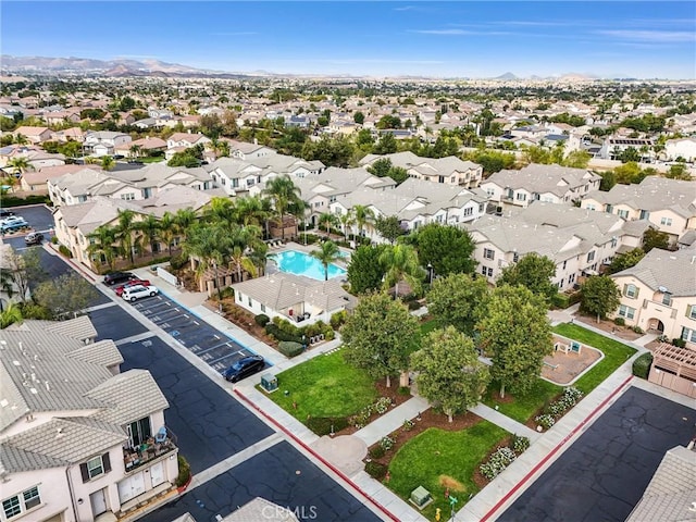 birds eye view of property featuring a mountain view