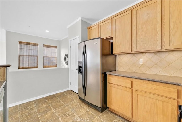 kitchen with tasteful backsplash, light brown cabinets, stainless steel refrigerator with ice dispenser, and ornamental molding