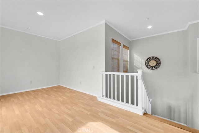 interior space featuring light hardwood / wood-style floors and crown molding