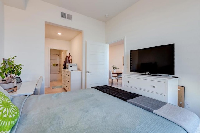 bedroom featuring ensuite bath