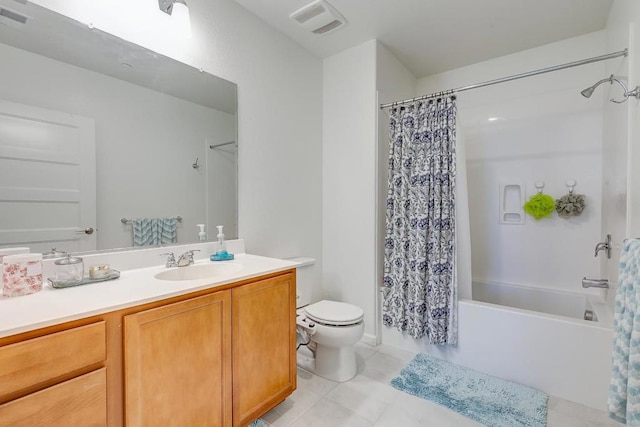 full bathroom featuring toilet, tile patterned flooring, shower / bath combo, and vanity