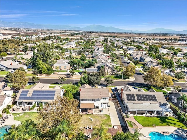 drone / aerial view featuring a mountain view