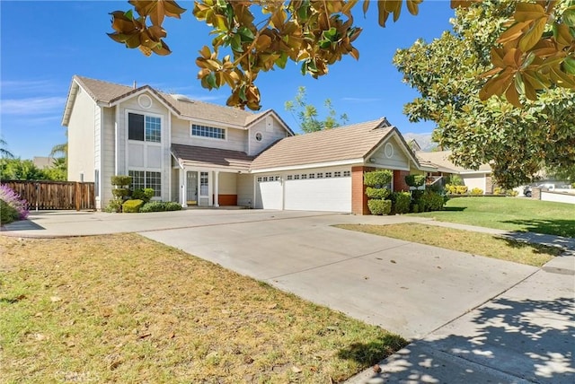 view of front property with a front yard and a garage