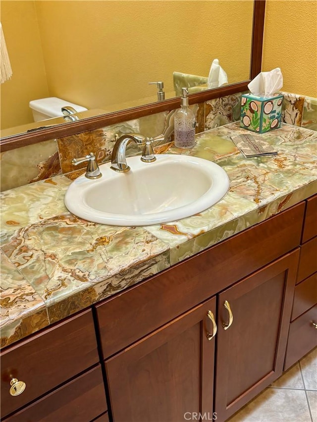 bathroom featuring vanity and tile patterned flooring