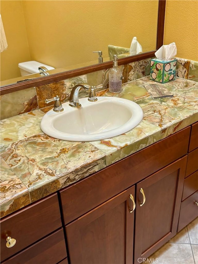 bathroom featuring vanity and tile patterned flooring