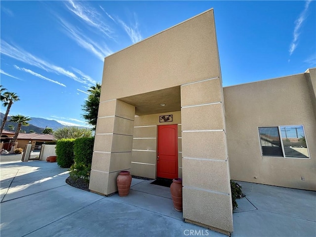 doorway to property featuring a mountain view