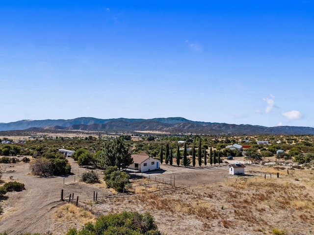 mountain view featuring a rural view