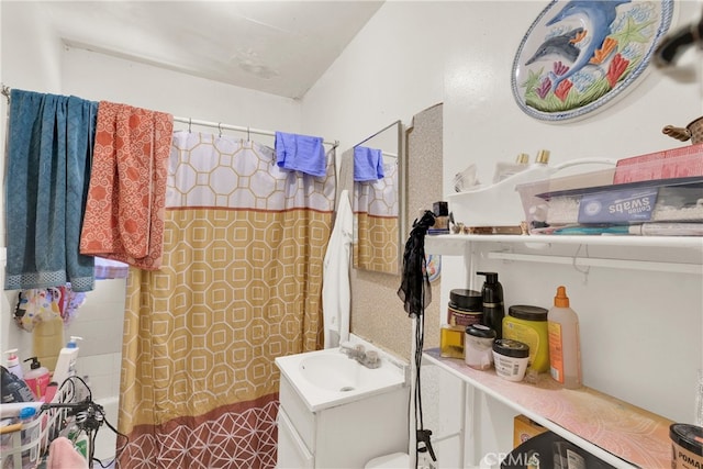 bathroom featuring vanity and a shower with curtain