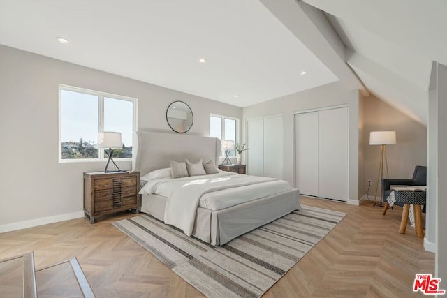 bedroom featuring light parquet floors