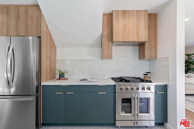 kitchen featuring decorative backsplash, light stone counters, light brown cabinets, and stainless steel appliances