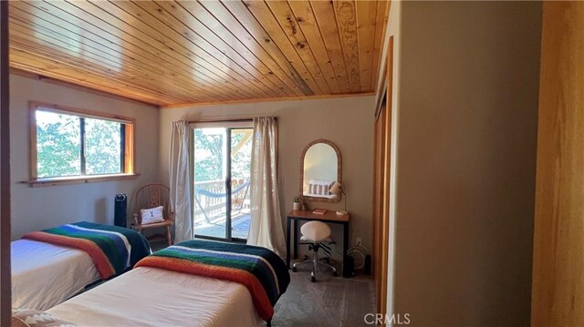 bedroom with access to exterior, crown molding, and wooden ceiling