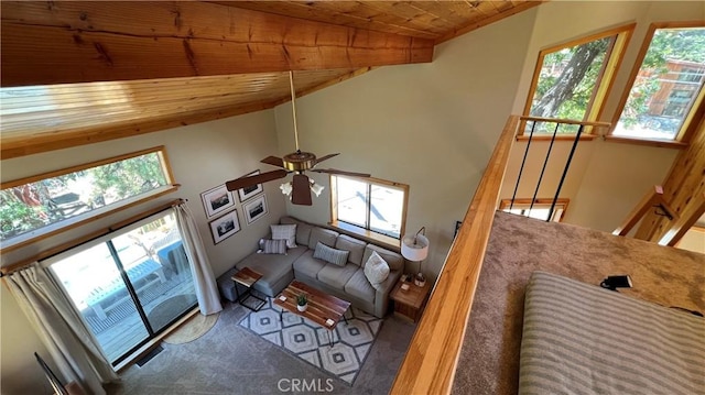 carpeted living room featuring ceiling fan, wooden ceiling, and vaulted ceiling