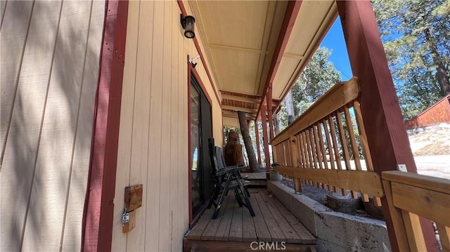 wooden terrace with covered porch