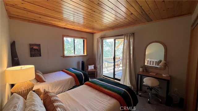 bedroom with wooden ceiling, crown molding, and access to outside