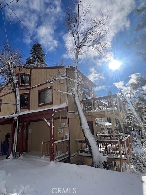 view of snow covered property