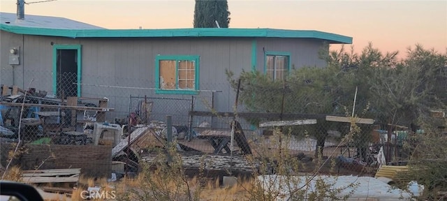 view of property exterior at dusk