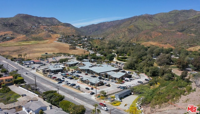 bird's eye view with a mountain view