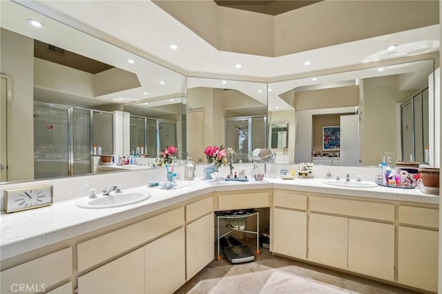 bathroom with vanity and walk in shower