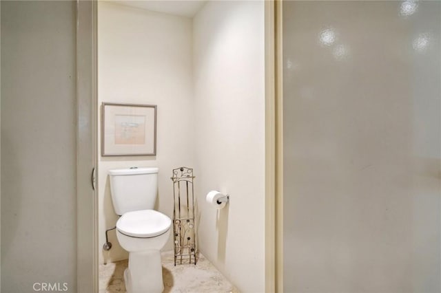 bathroom featuring toilet