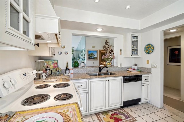 kitchen featuring light stone countertops, sink, light tile patterned floors, white appliances, and white cabinets